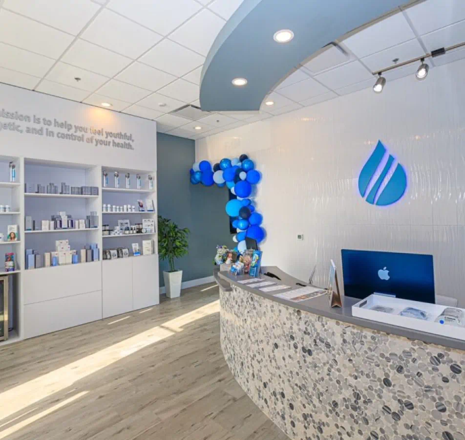 Reception area in a spa with a reception desk and computer