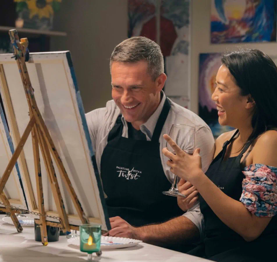 Man and woman at a painting class