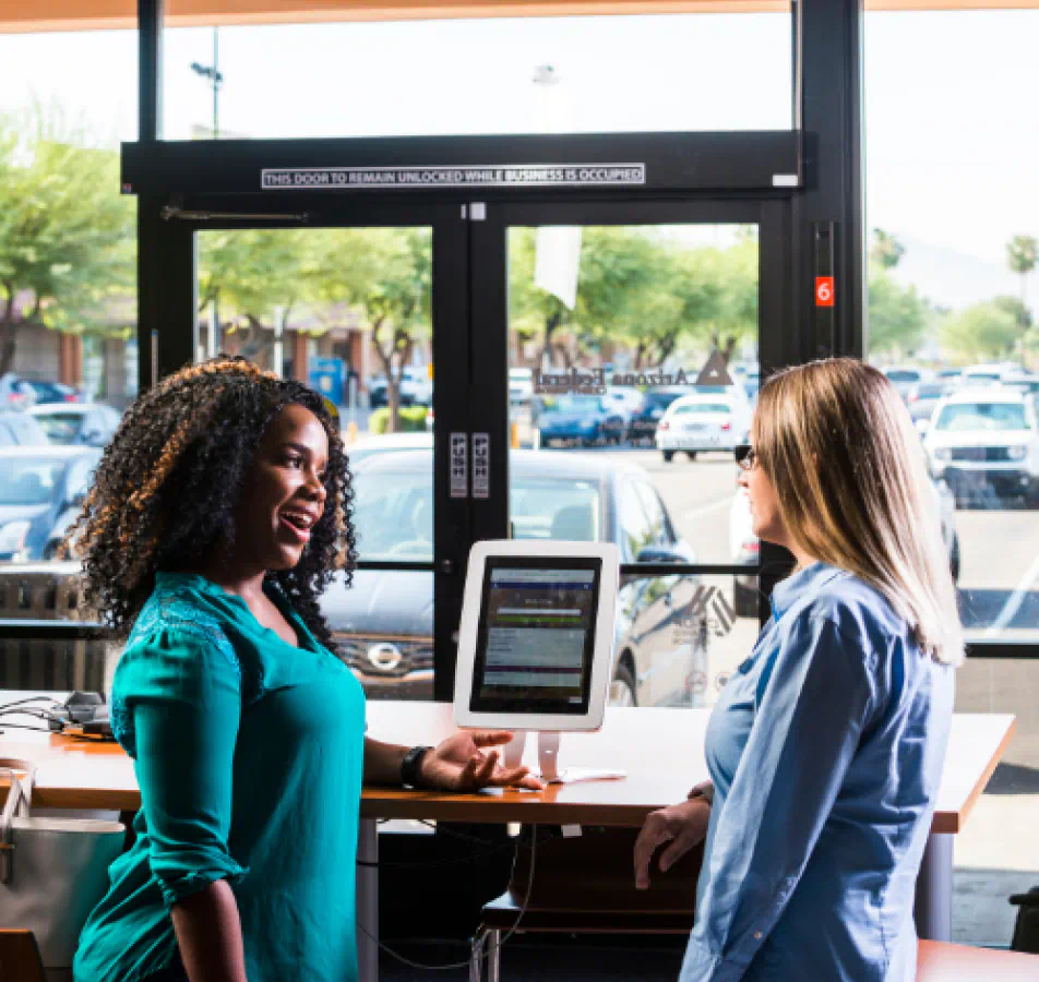 Two woman talking