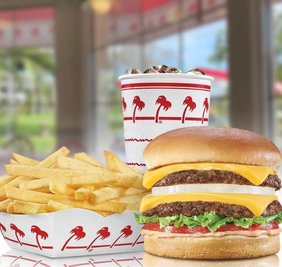 Double Double Cheese burger with fries and a drink.