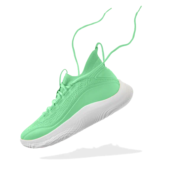 A green running shoe suspended in air with a white sole and loose laces.