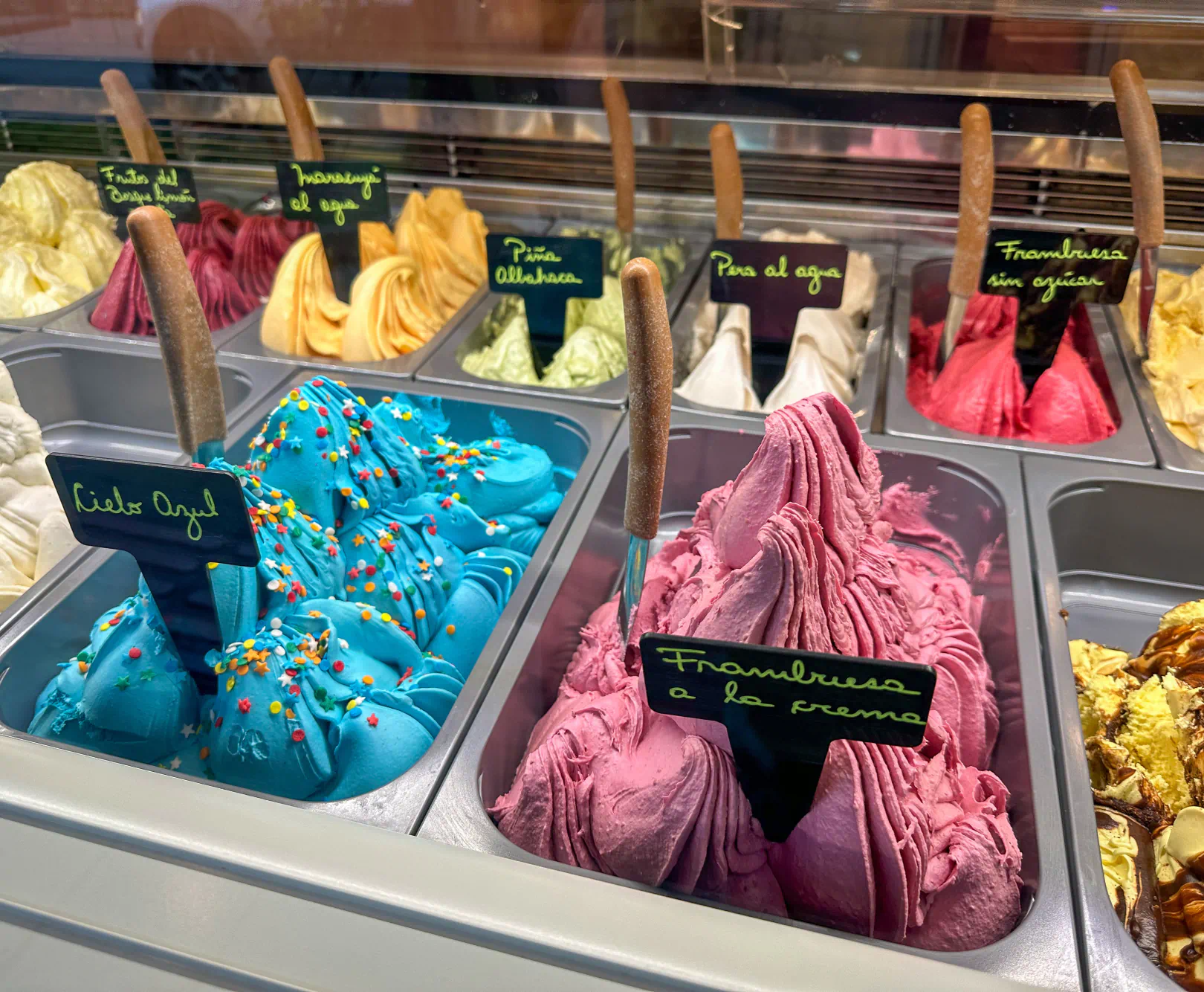 Gelato case with various flavors displayed