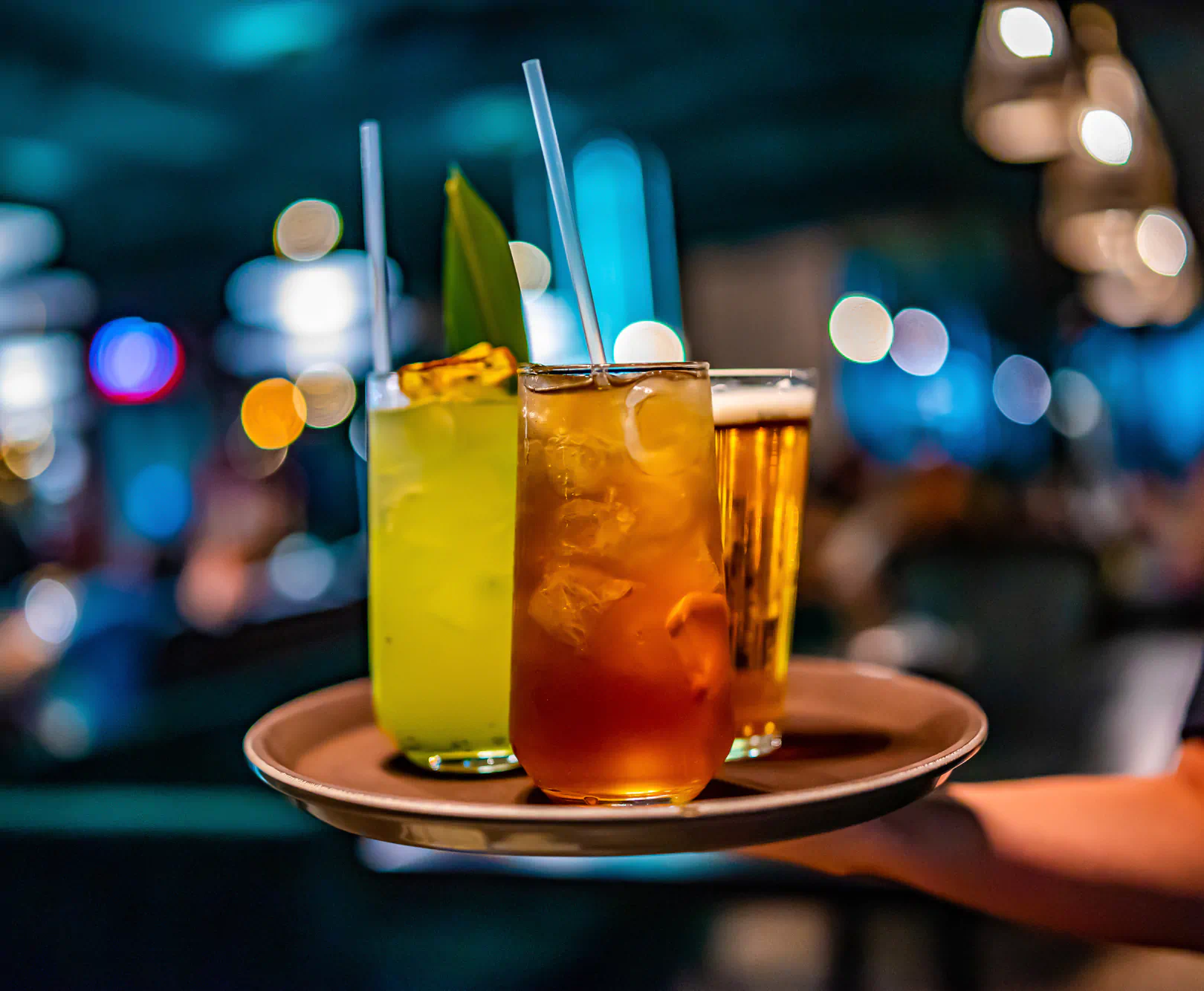 Serving tray holding cocktails and beer